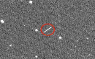 A car-sized asteroid zips past Earth in closest flyby on record
